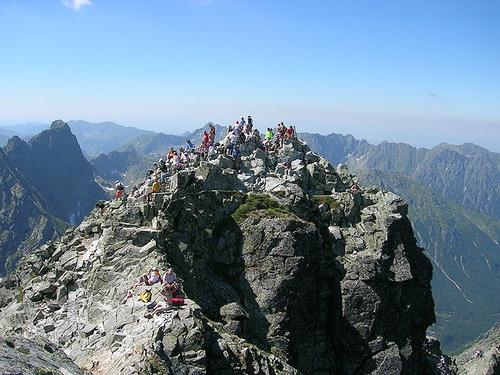 People at the top of the Rysy, highest mountain in Poland 