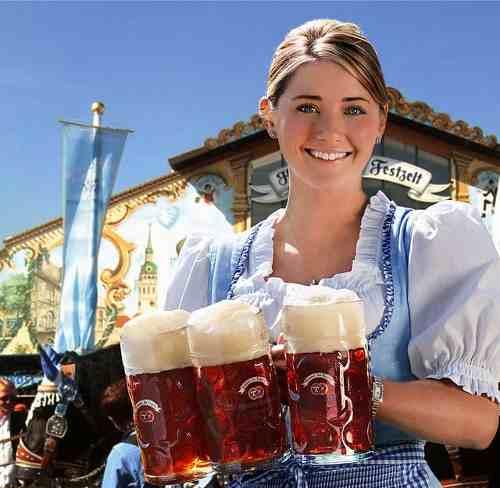 Waitress with three mugs of Hacker-Pschorr beer