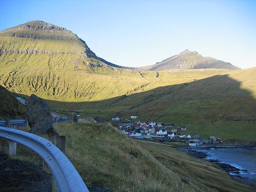 Village of Funningur at the foot of the Slættaretindur (left) and the Gráfeli (right), Faroe Islands
