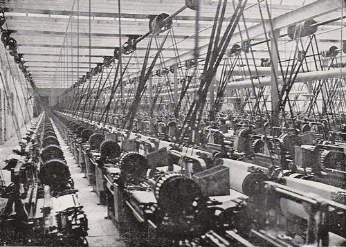 Steam engine-powered weaving mill in England