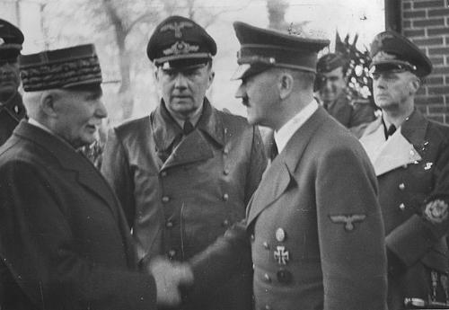 Philippe Pétain shake hands with Adolf Hitler