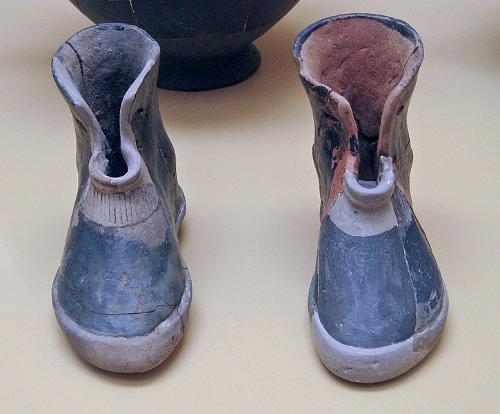 Ancient Greek pair of terracotta boots