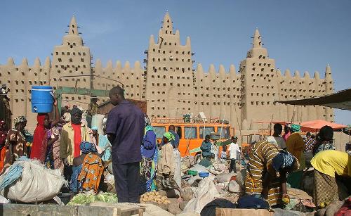 Market in front of the great mosque of Djenné in Mali