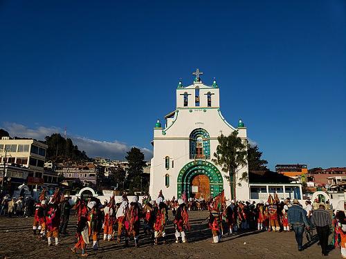Tzotzil carnival participants doing rituals and traditional carnival dances in the San Juan Chamula temple
