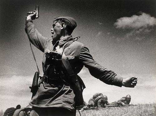 Soviet officer leading his soldiers in WW II, Russia