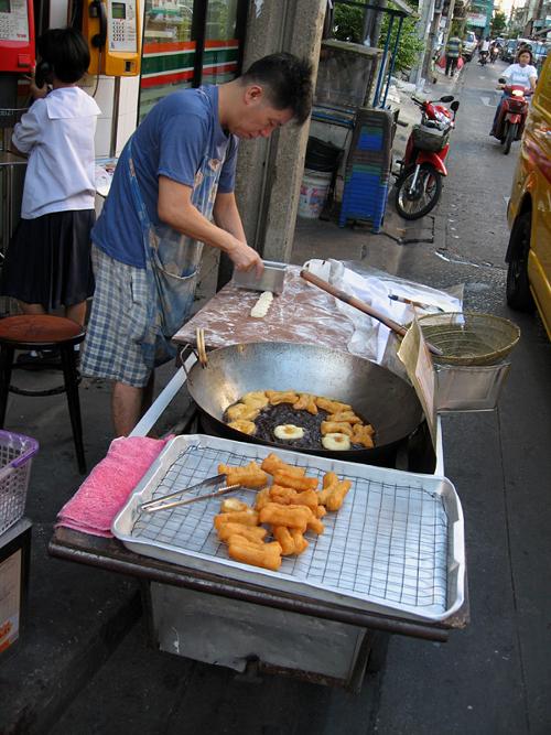 Chinese street food seller in Thailand