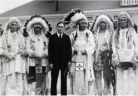  John Collier, Commissioner of Indian Affairs, meets with South Dakota Blackfoot Indian chiefs in 1934 to discuss the Wheeler-Howard Act, later known as the Indian Reorganization Act
