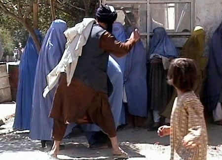 Taliban religious police beat woman in public in Kabul